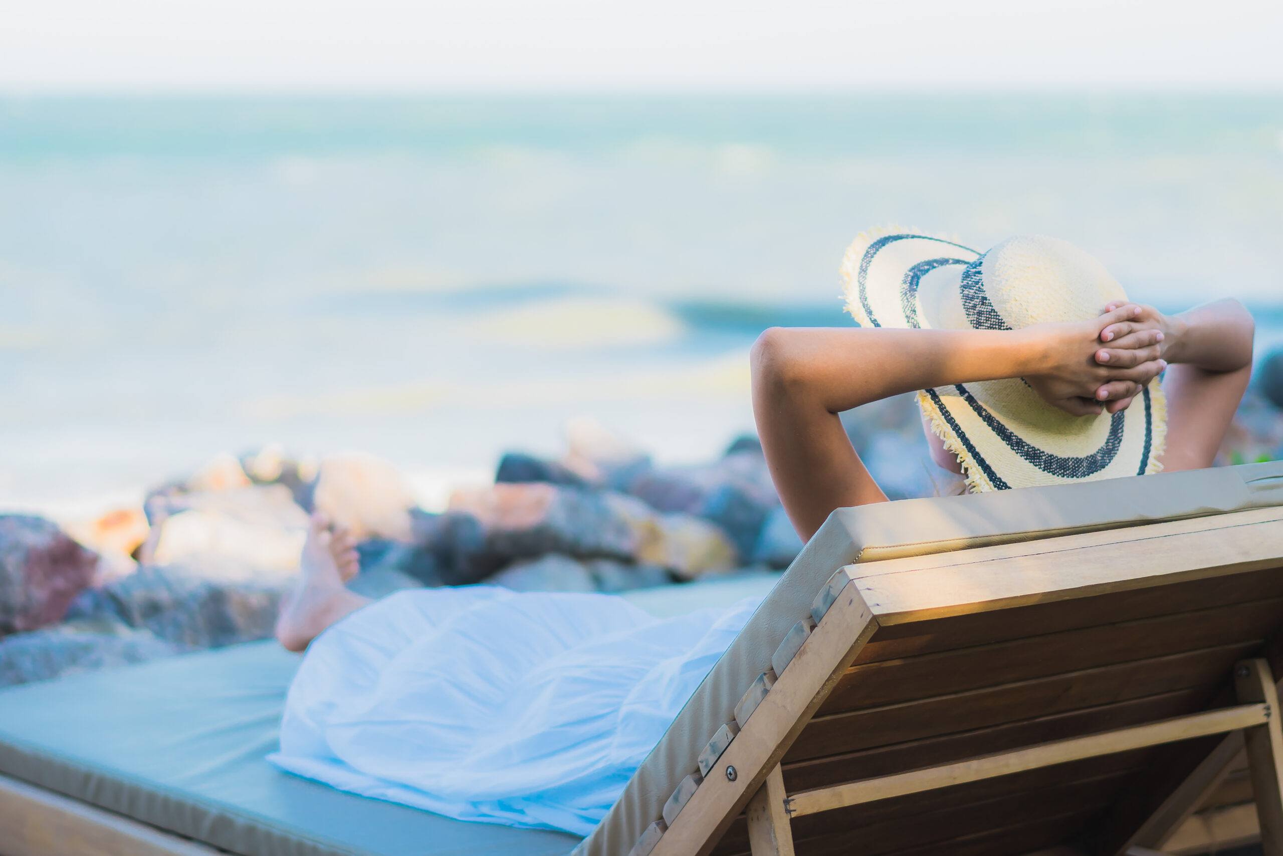 Surpriză pentru bugetari: Voucherele de vacanță din 2025 vin cu reguli stricte și contribuție personală! 1 portrait beautiful young asian woman happy smile relax around neary beach sea scaled